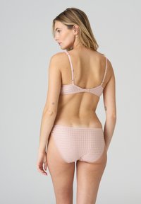 Light pink checkered bra and matching panties feature lace trim, adjustable straps, and a smooth texture with a seamless finish.
