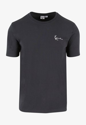 Black cotton t-shirt with short sleeves, round neckline, and a white logo printed on the left chest area. Smooth texture, casual design.