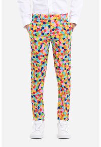 Pantaloni colorati a fantasia con una varietà di cerchi in rosa, verde, blu, giallo e arancione su uno sfondo chiaro. Design aderente.