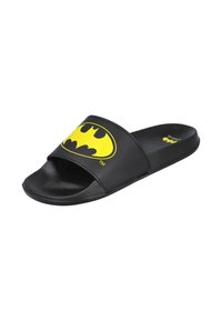 Chanclas negras con una correa negra texturizada que presenta el logo amarillo de Batman. Suela lisa con diseño de punta abierta, aptas para uso casual.
