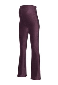Leggings évasés en velours violet avec une taille extensible, des coutures latérales et une texture lisse, conçus pour offrir confort et liberté de mouvement.