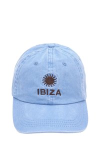 Light blue cotton cap with a stiff brim, featuring brown embroidered sun design and "IBIZA" text on the front. Distressed texture.