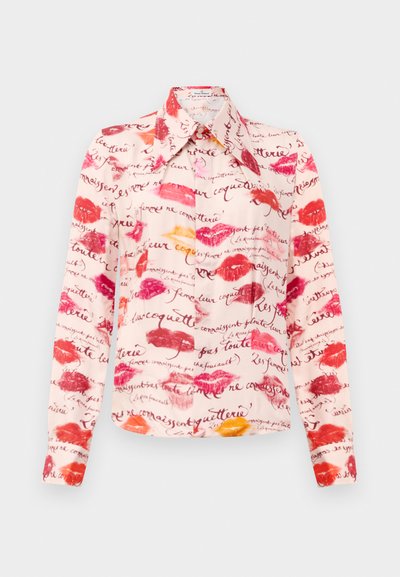 Long-sleeve shirt with a soft, lightweight fabric featuring a pink background adorned with red and orange lip prints and handwritten text.