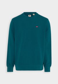 Felpa verde acqua con maniche lunghe, scollo a girocollo e polsini a costine. Presenta un piccolo logo Levi's rosso sul petto. Tessuto morbido in misto cotone.