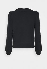 Musta collegepaita, jossa on pussimaiset pitkät hihat, pyöreä pääntie ja lyhyt helma. Valmistettu pehmeästä ja sileäpintaisesta kankaasta.