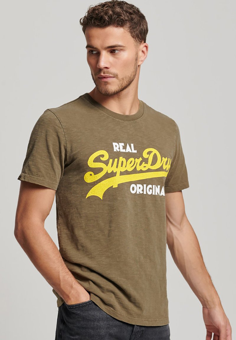 T-shirt Superdry Vintage Logo Creatures Manica Corta - Foto 11