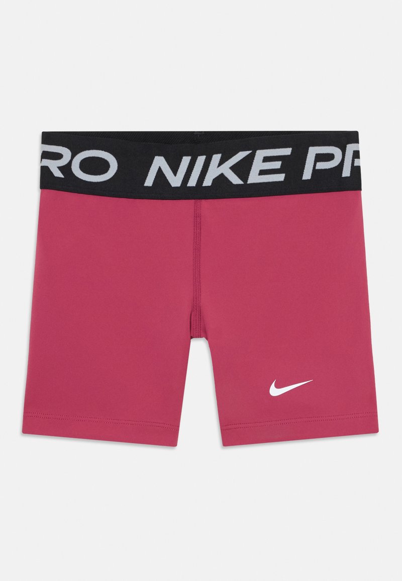 Rozā sporta šorti ar pieguļošu dizainu, melna jostasvieta ar uzrakstu "NIKE PRO" un mazs balts Nike logotips apakšmalā. Gluda tekstūra.