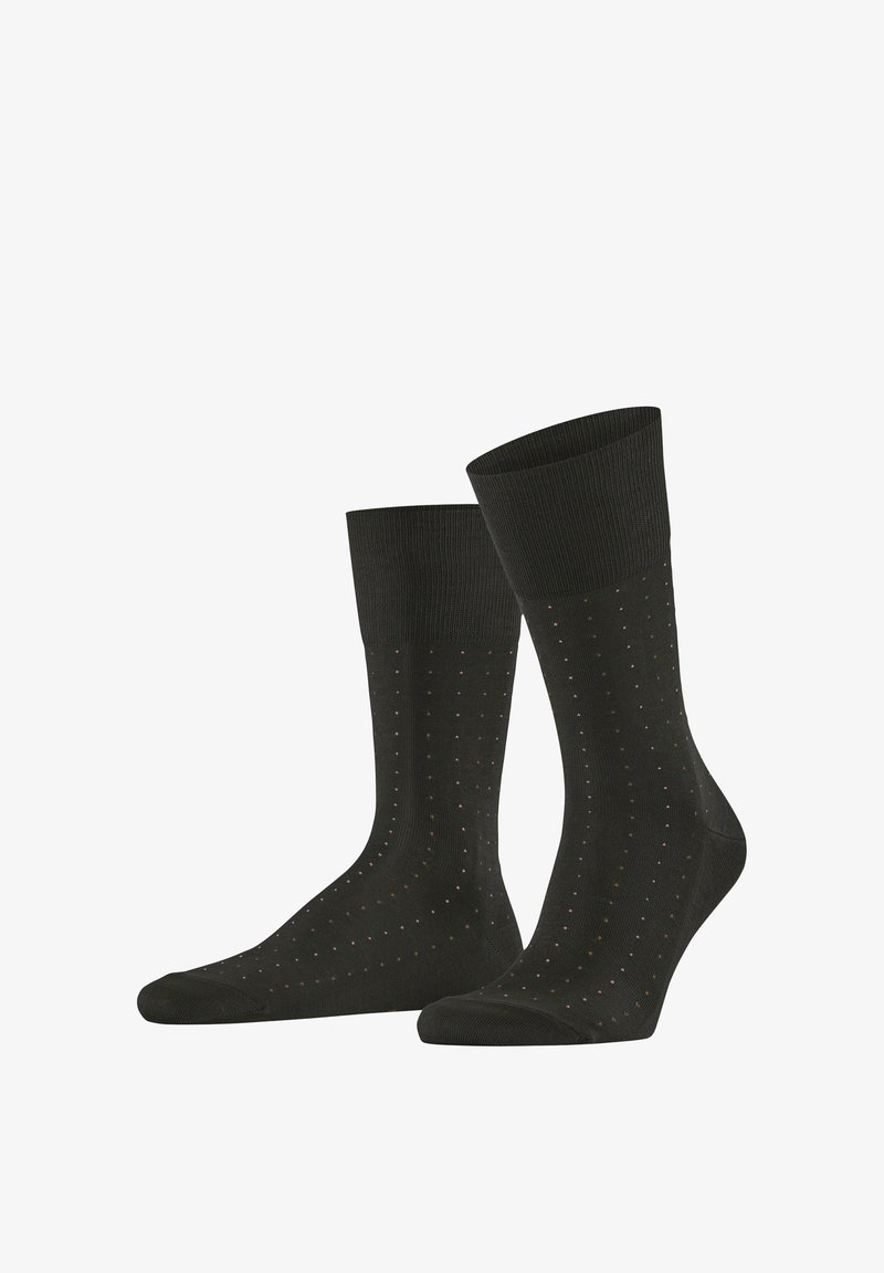 Paire de chaussettes noires montant jusqu'au milieu du mollet, ornées de petits pois roses et marron disposés en rangées verticales sur un fond blanc.
