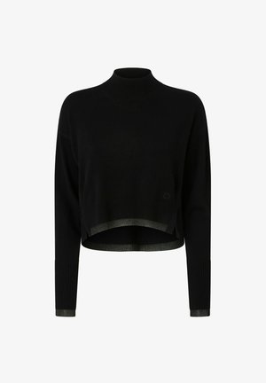 Crna skraćena dukserica s visokim ovratnikom, rebrastom teksturom i kontrastnim zelenim rubom. Ima duge rukave i bočne proreze na dnu.