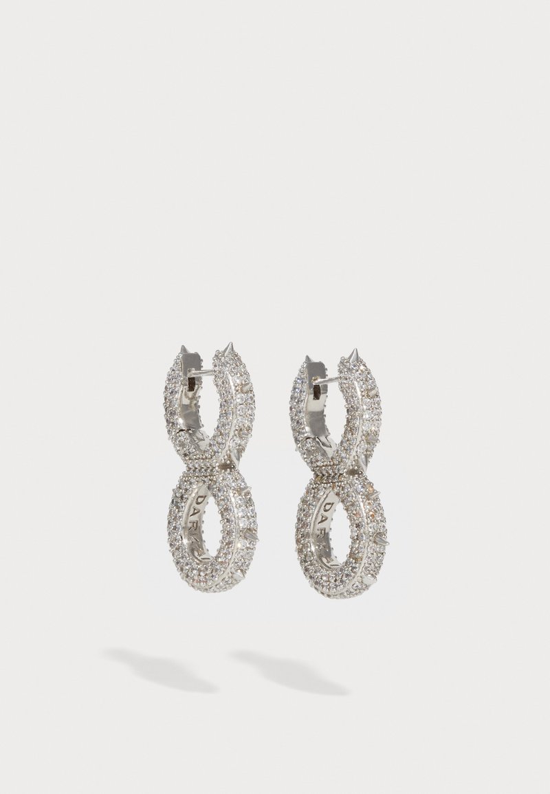 Silver earrings featuring intertwined loop design, encrusted with small clear rhinestones, with a shiny finish and hinged clasp.