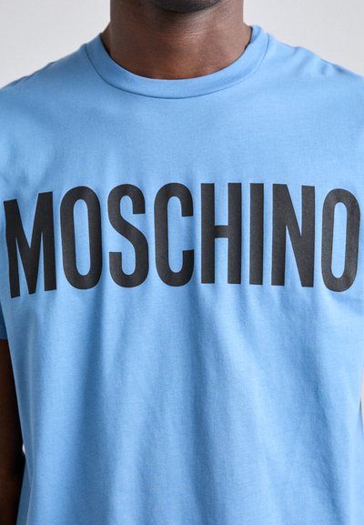 MOSCHINO Marškinėliai su spaudiniu - fantasia azzurro