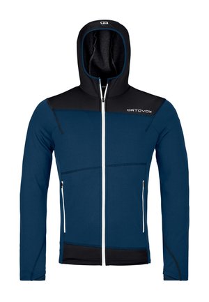Blau-schwarze Kapuzenjacke mit Reißverschluss, weißem Reißverschluss und Seitentaschen, mit "ORTOVOX"-Logo auf der Brust.