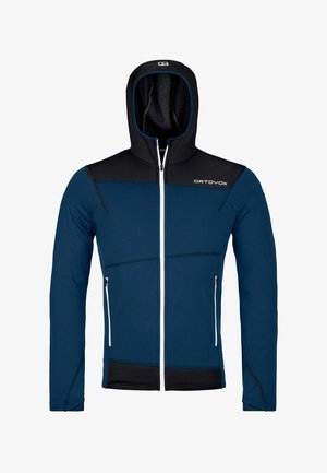 Blau-schwarze Kapuzenjacke mit Reißverschluss, weißem Reißverschluss und Seitentaschen, mit "ORTOVOX"-Logo auf der Brust.
