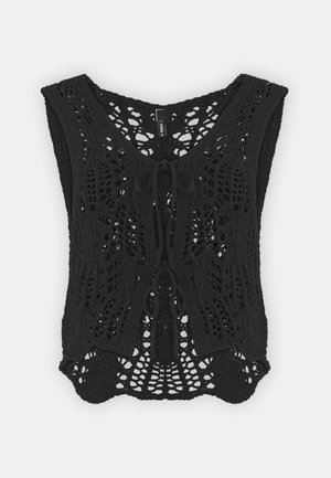 Black crochet vest with a v-neckline, intricate open-knit pattern, and tie detail at the front. Loose fit with wide armholes.
