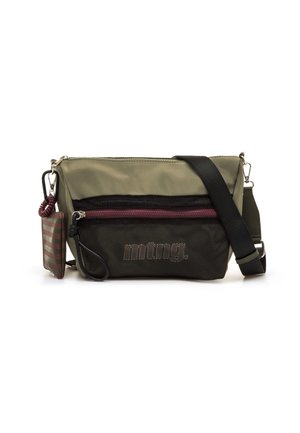 Sac bandoulière vert olive avec poche avant en maille noire, fermeture éclair violette, sangle noire réglable et petite pochette rayée attachée.