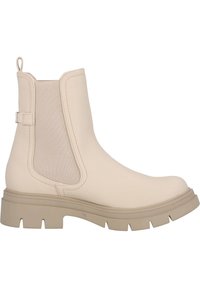 Botas Chelsea beige con parte superior texturizada, paneles laterales elásticos y una suela de goma gruesa con profundas ranuras para mayor tracción.