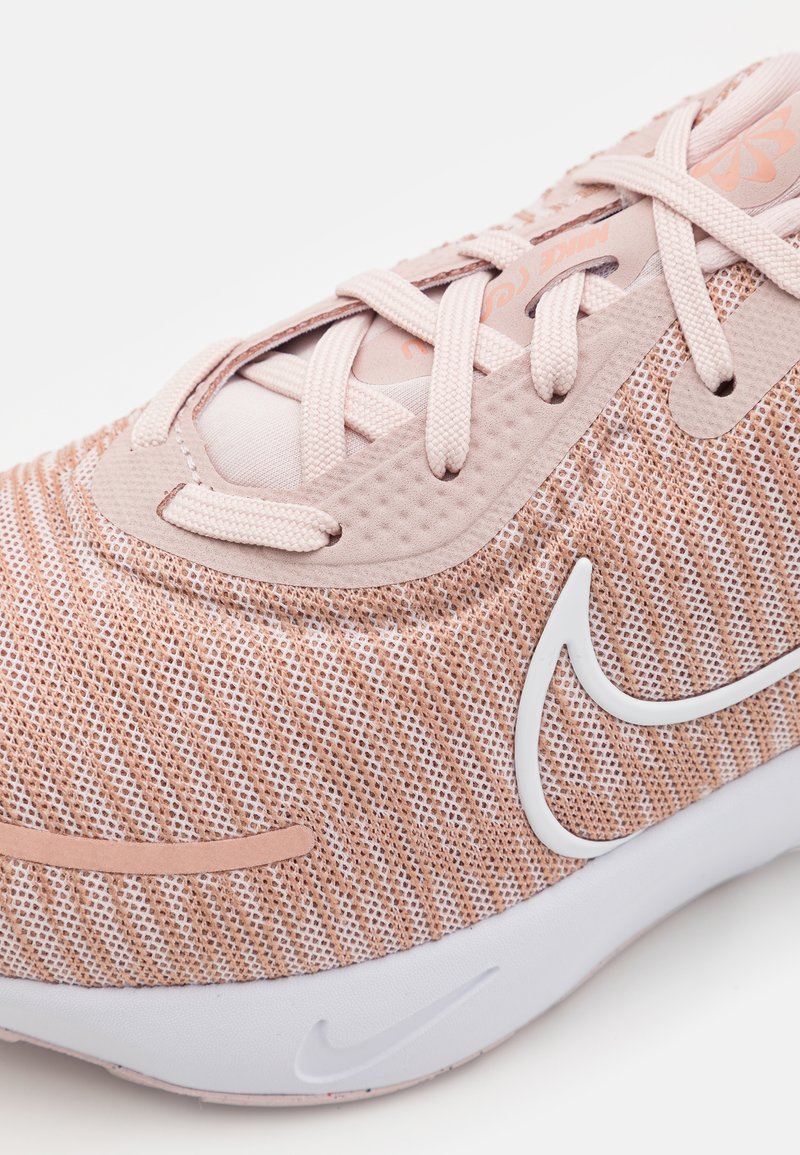 nike running renew run 2 trainers in pink