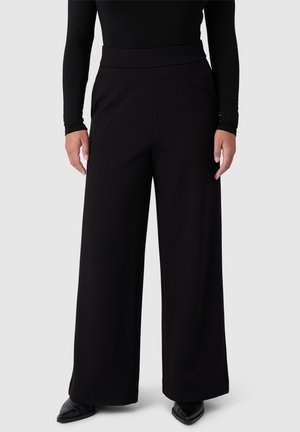 Pantalon classique - schwarz