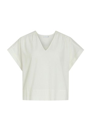 White short-sleeve blouse with a V-neck, slightly gathered shoulders, and a loose, boxy fit.