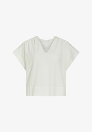 White short-sleeve blouse with a V-neck, slightly gathered shoulders, and a loose, boxy fit.