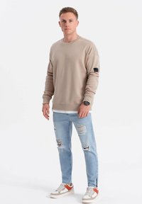 Ombre Felpa - beige