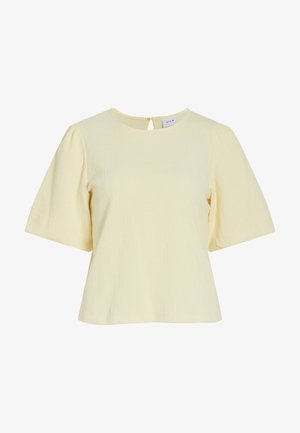 Hele kollase lühikeste varrukatega pluus ümara kaelusega, tekstuurse kangaga ja väikese nupu kinnitusega seljal.