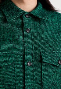 J.LINDEBERG Lehká bunda - green