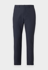 Pantaloni ușori de culoare albastru marin cu un design aerodinamic, dotati cu închidere cu buton, curea și o textură fină. Croi ajustat.