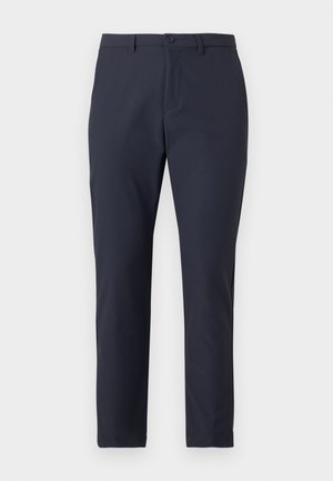 Pantaloni ușori de culoare albastru marin cu un design aerodinamic, dotati cu închidere cu buton, curea și o textură fină. Croi ajustat.