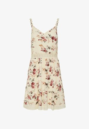 Vestido floral en crema con flores rosas y burdeos. Presenta borde de encaje, tirantes ajustables y una silueta fluida. Material de mezcla de algodón.