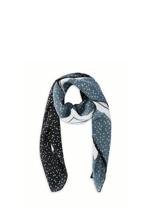 Jedwabny szalik z czarnymi i niebieskimi fragmentami, ozdobiony rozrzuconymi białymi kropkami polka i luźno złożony.