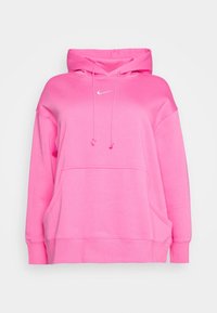 Pink oversized hoodie made of soft fabric, featuring a front kangaroo pocket, drawstring hood, and a small white Nike logo on the chest.