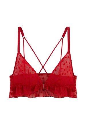 Bralette rouge transparent avec petits motifs de cœurs, bretelles ajustables, design dos croisé et détail de bord volanté.
