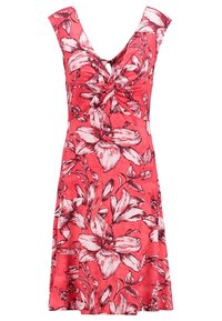 Robe sans manches couleur corail rose avec imprimé floral blanc et rouge foncé, encolure en V et détail d'un nœud torsadé au niveau de la poitrine.