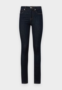 Ciemnoniebieskie dżinsy typu skinny z pięcioma kieszeniami, z zapięciem na guzik i kontrastującymi pomarańczowymi szwami. Gładka faktura i dopasowany krój.