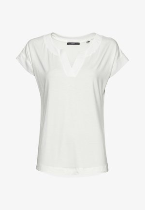 Biała damska bluzka z krótkim rękawem, dekoltem w kształcie litery V i luźnym krojem, wykonana z lekkiego, gładkiego materiału.