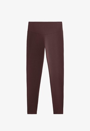 Magas derekú, teljes hosszúságú, sötétbarna leggings sima, széles derékpánttal, látható logók vagy minták nélkül.