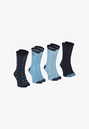 Quatre paires de chaussettes : une noire avec un motif de bicyclettes, deux bleu clair (une unie, une rayée), et une bleue foncée unie, toutes avec des bords contrastés.
