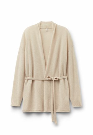 Beige wikkelcardigan van zachte stof, met een strikceintuur in de taille, open voorkant en lange mouwen met subtiele stikdetails.