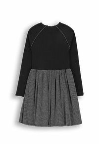 Czarny prążkowany top z długimi rękawami, przechodzący w szaro-plecioną spódnicę. Posiada okrągły dekolt i kontrastowe szwy.