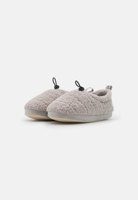 Gray fluffy slippers with a textured surface, rounded shape, and black accents. Soft interior lining and flexible rubber soles.