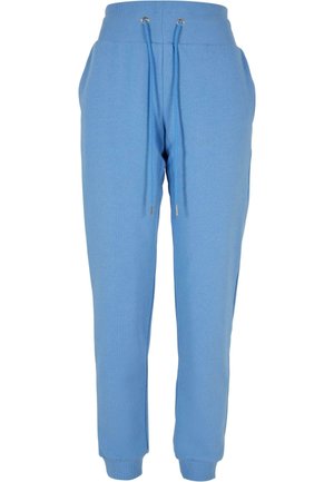 Ljust blå joggers i mjukt material, med ribbad midja med dragsko och taperade muddar vid anklarna.