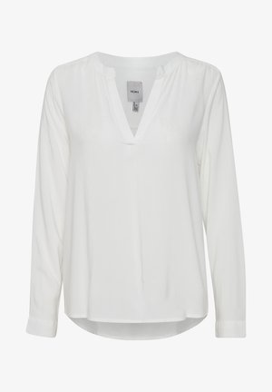 Baltu garo piedurkņu blūze ar V-veida kakla izgriezumu, izgatavota no viegla materiāla, ar brīvu piegriezumu un nedaudz izliekta apakšmalu. Etiķete redzama iekšpusē.