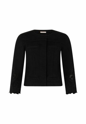 Giacca nera a maniche lunghe con collo tondo, chiusura frontale nascosta, cuciture decorative e ricamo floreale sui polsini smerlati.