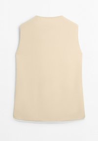 Beige sleeveless top with a simple, smooth back and a round neckline, displayed flat on a white background.