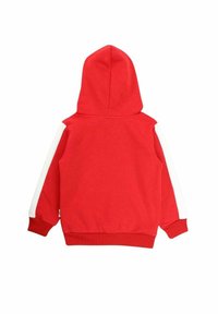 Sweatshirt à capuche rouge en tissu mélangé coton, avec des bandes blanches contrastantes le long des manches et un ourlet côtelé.