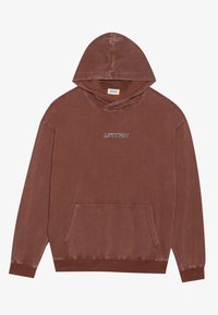 Hnedá mikina s voľným strihom, predným vreckom a kapucňou. Materiál má jemnú textúru a na hrudi je v bielej farbe vytlačené "URTRN".