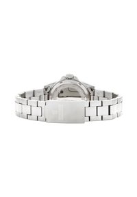 Orologio in acciaio inossidabile argento con bracciale solido, cassa rotonda e corona texturizzata. Presenta una fibbia con marchio e un cristallo zaffiro.