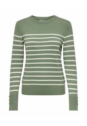 Maglione verde con strisce orizzontali bianche, design aderente, scollo rotondo, maniche lunghe e dettagli con bottoni sui polsini. Tessuto morbido.
