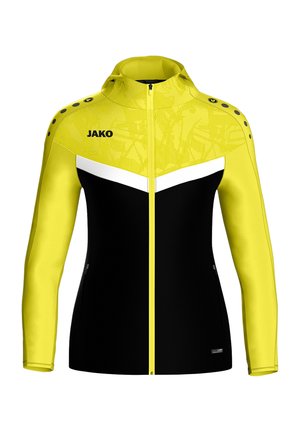 Zwarte en gele sportjas met een rits aan de voorkant, wit chevron-ontwerp, gestructureerd bovenstuk en knopen op de schouders. Voorzien van ritszakken.